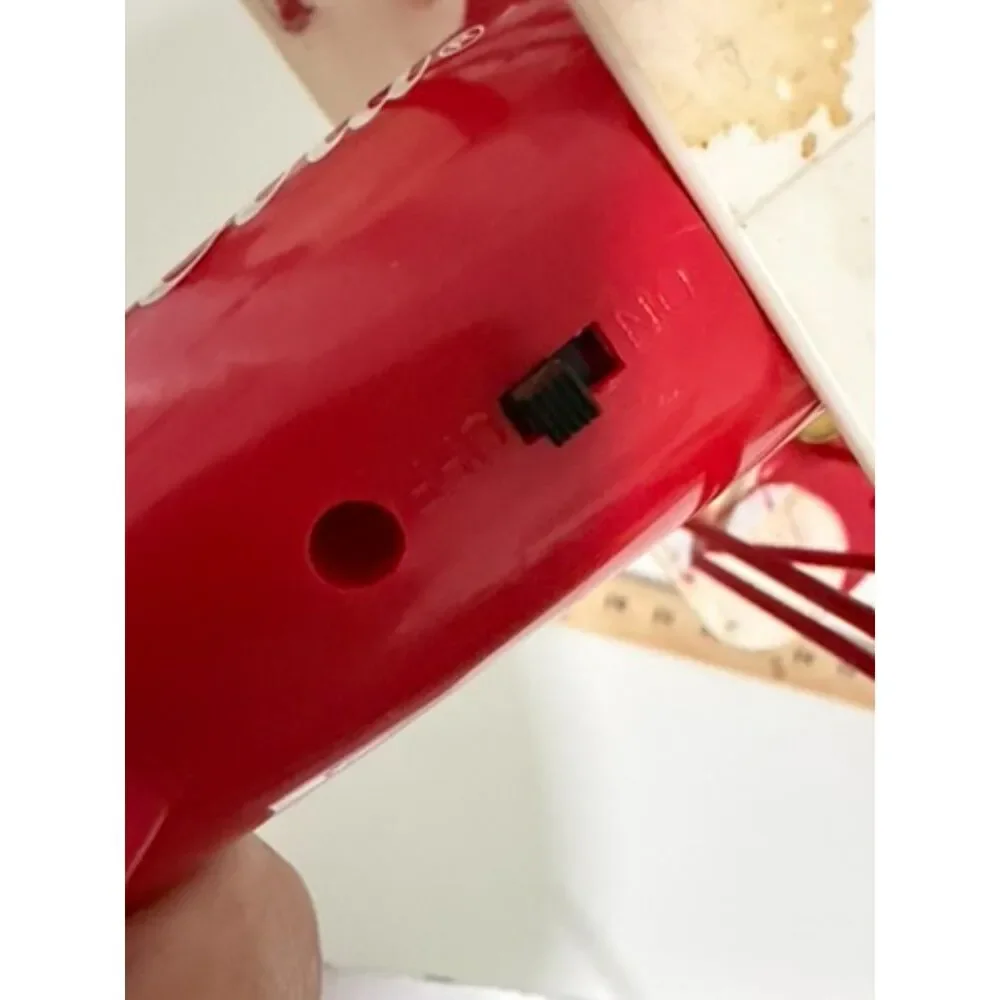 Vtg. Coca cola christmas decoration featuring a polar bear in a red biplane